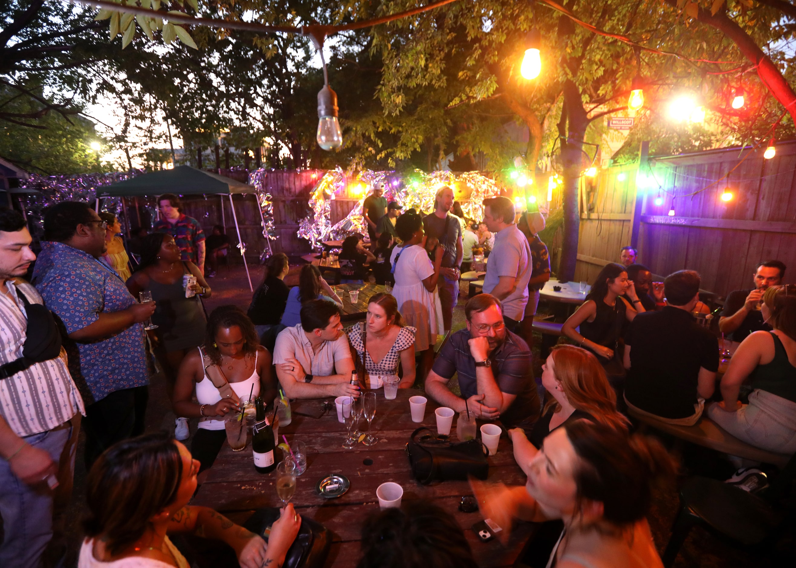 Guests enjoy one last evening at the Grapevine Bar in Dallas, TX, on Aug 23, 2023.  (Jason...