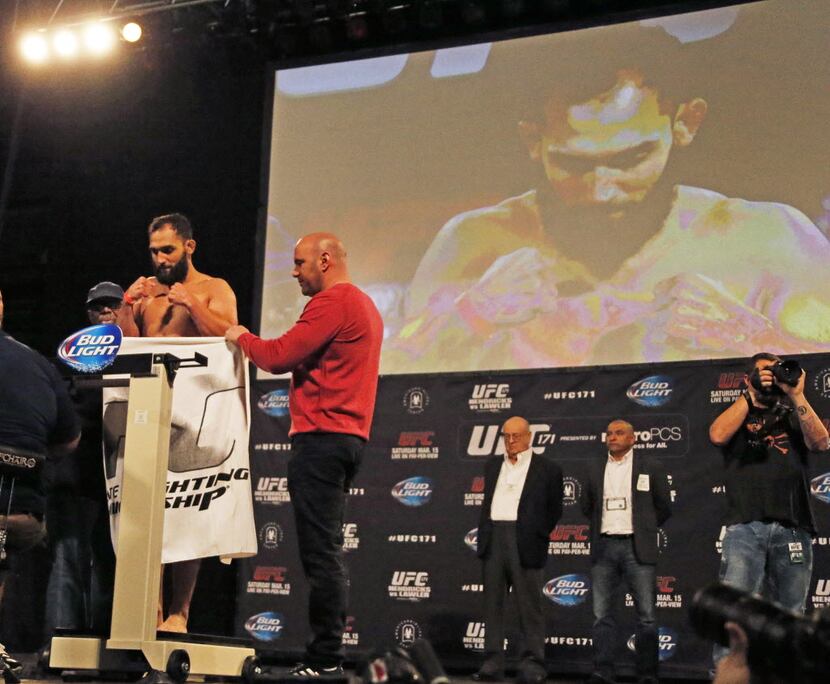Johny Hendricks weighs in during UFC weigh-ins at Gilley's in Dallas for Saturday's event at...