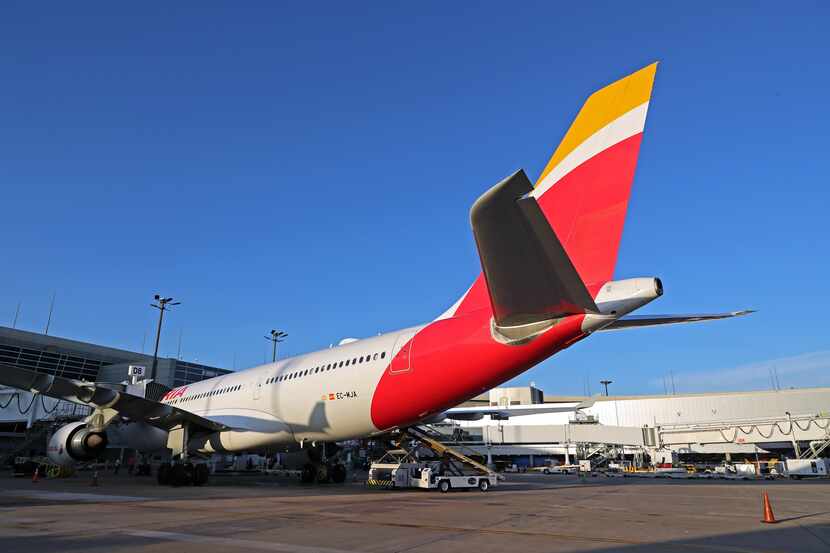 An Iberia Airbus A330-200 parked at DFW International Airport's Terminal D for the airline's...