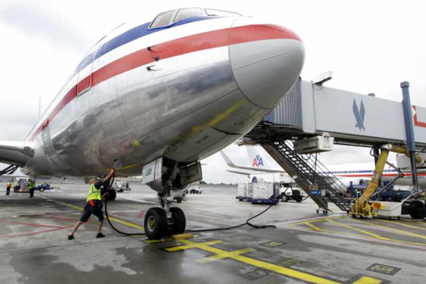 American Airlines grounds crew service and arriving flight at JFK International Iirport in...