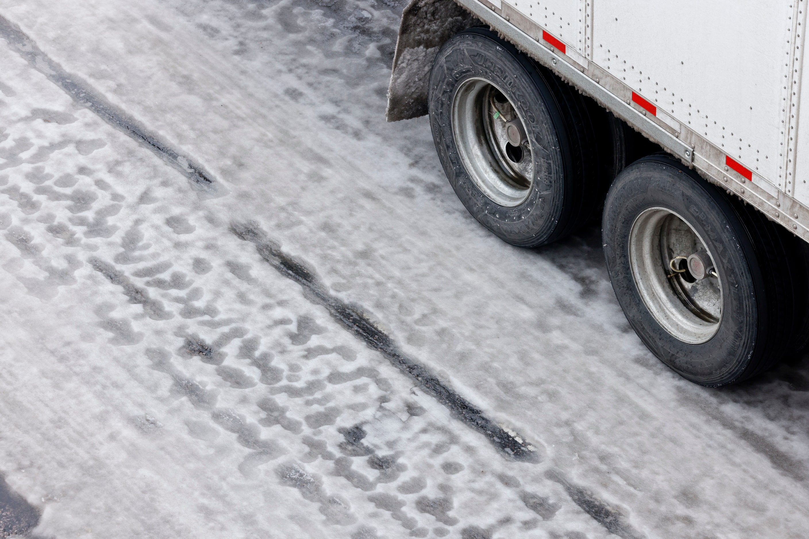 Ice covers westbound I-20 near Cedar Ridge Drive and Loop 408 in Dallas, Tuesday, Jan. 31,...