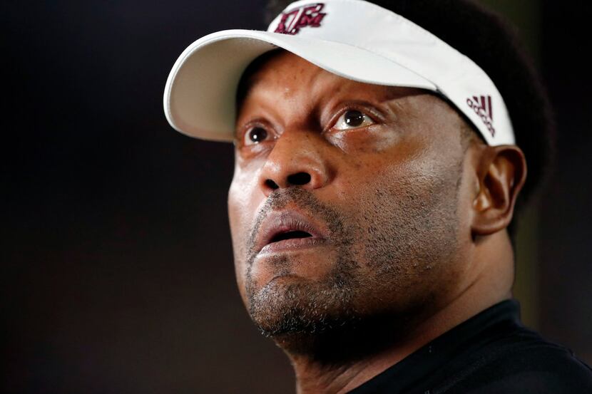Texas A&M head coach Kevin Sumlin looks at the scoreboard prior to an NCAA college football...