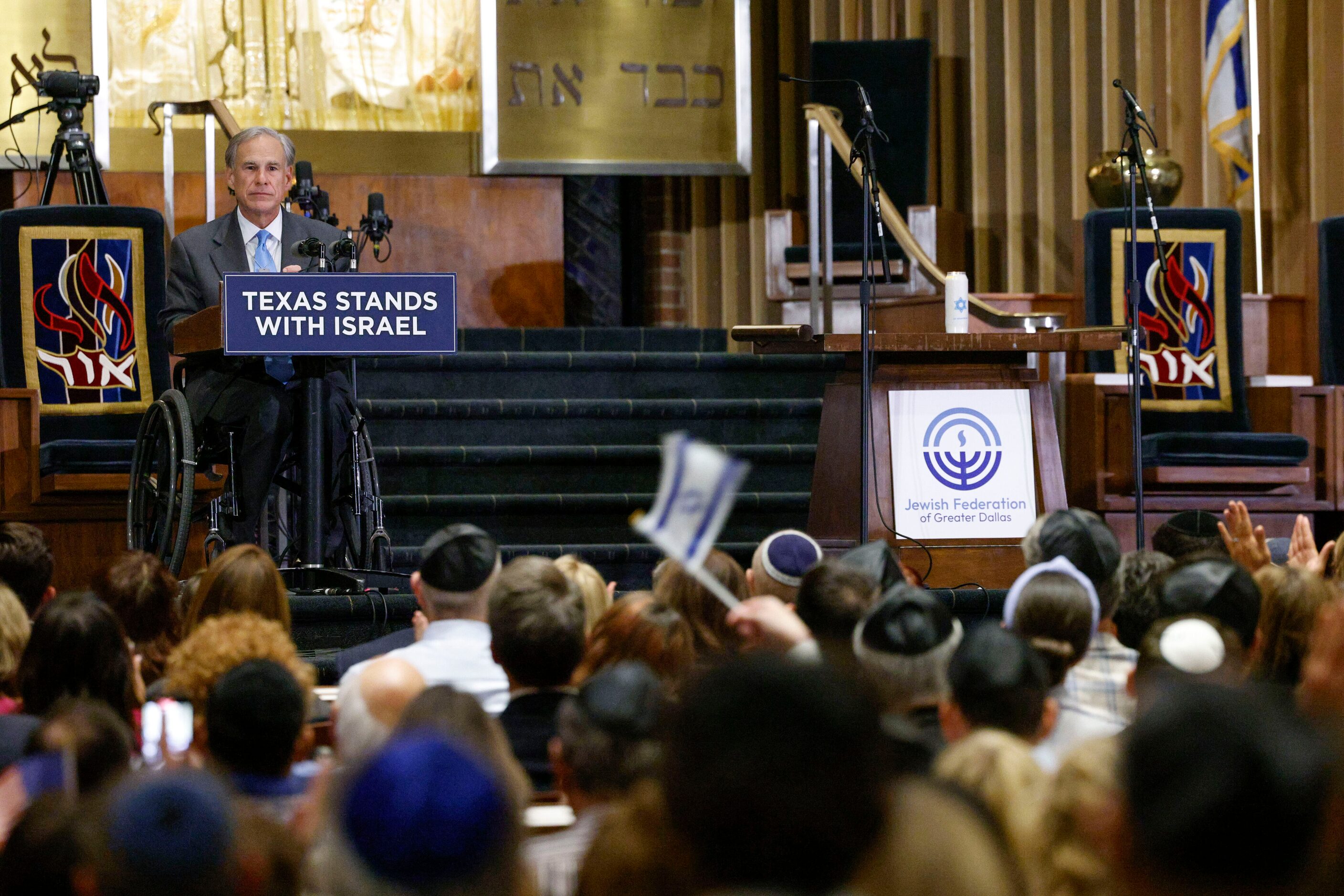 Gov. Greg Abbott speaks during a community event commemorating the Oct. 7, 2023 attack in...