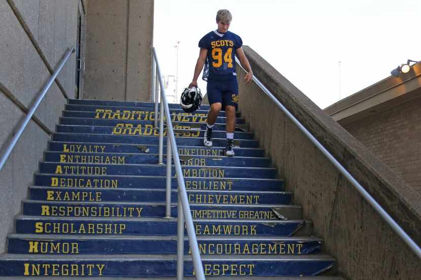 Highland Park senior linebacker Matt Gahm heads to the field for the first football practice...