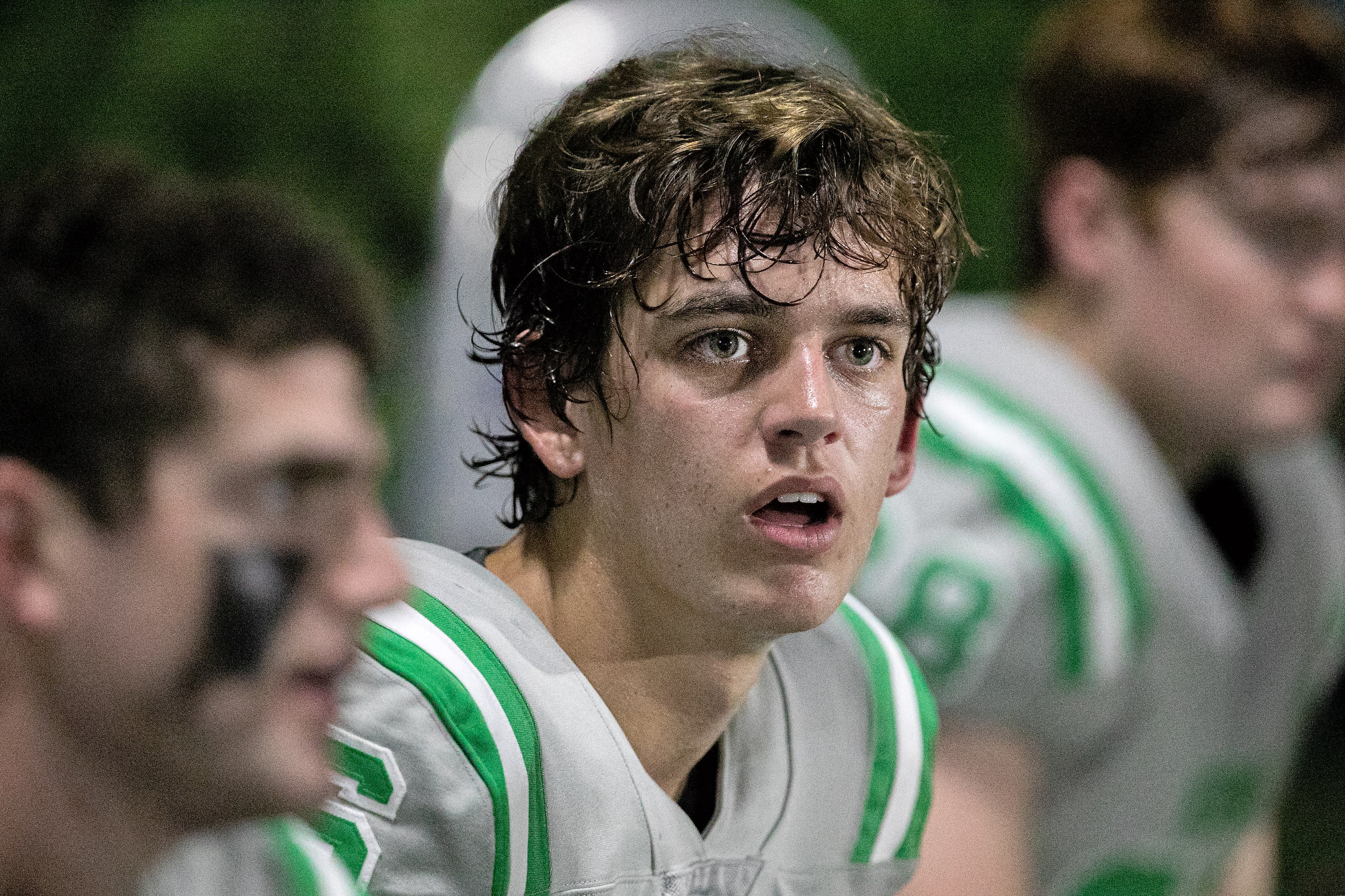 Arch Manning and teammates take a break as Newman High School takes on Riverside Academy...