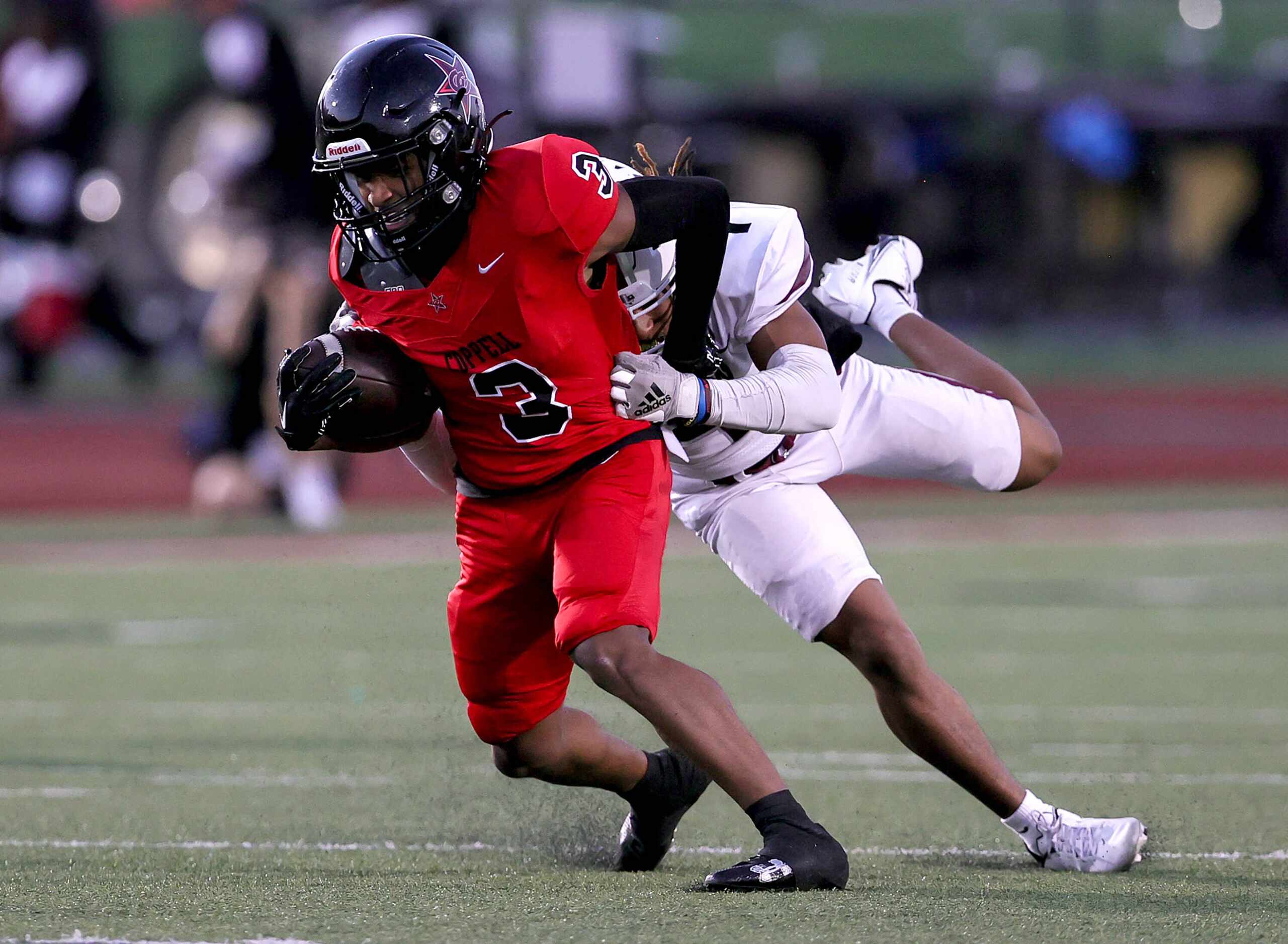 Coppell wide receiver Ayrion Sneed (3) comes up with a reception against Lewisville...