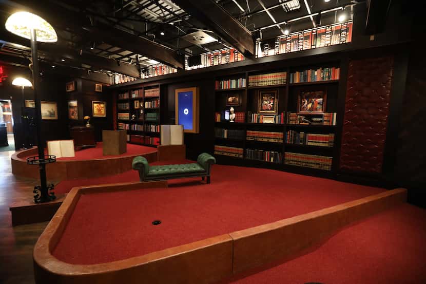 A hole in the Library room at Puttery, a new indoor mini golf and entertainment concept in...