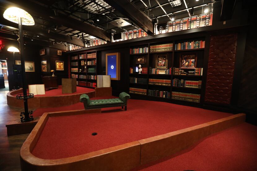 A hole in the Library room at Puttery, a new indoor mini golf and entertainment concept in...