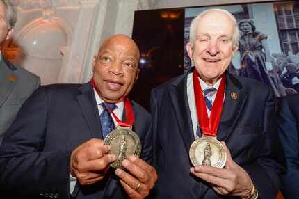 U.S. Reps. John Lewis and Sam Johnson displayed their awards from the Bipartisan Policy...