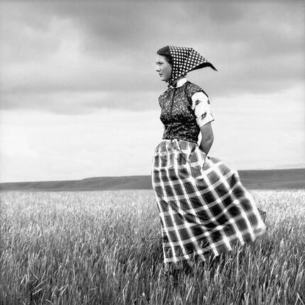 Hutterite Girl in Field at Duncan Ranch Colony in Harlowton, Mont., in 1994.