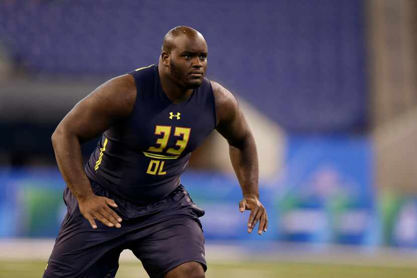 Western Michigan offensive lineman Taylor Moton runs a drill at the NFL football scouting...