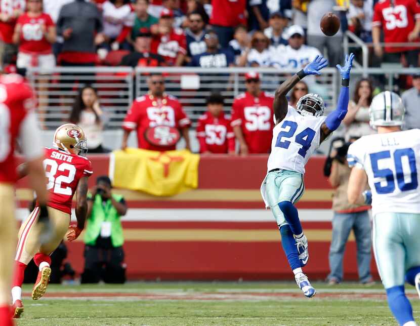 Dallas Cowboys cornerback Morris Claiborne (24) intercepts a pass in front of San Francisco...