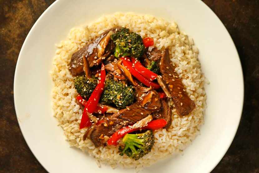 Beef broccoli with brown rice photographed, Wednesday, March 4, 2015 at the home of Tina...