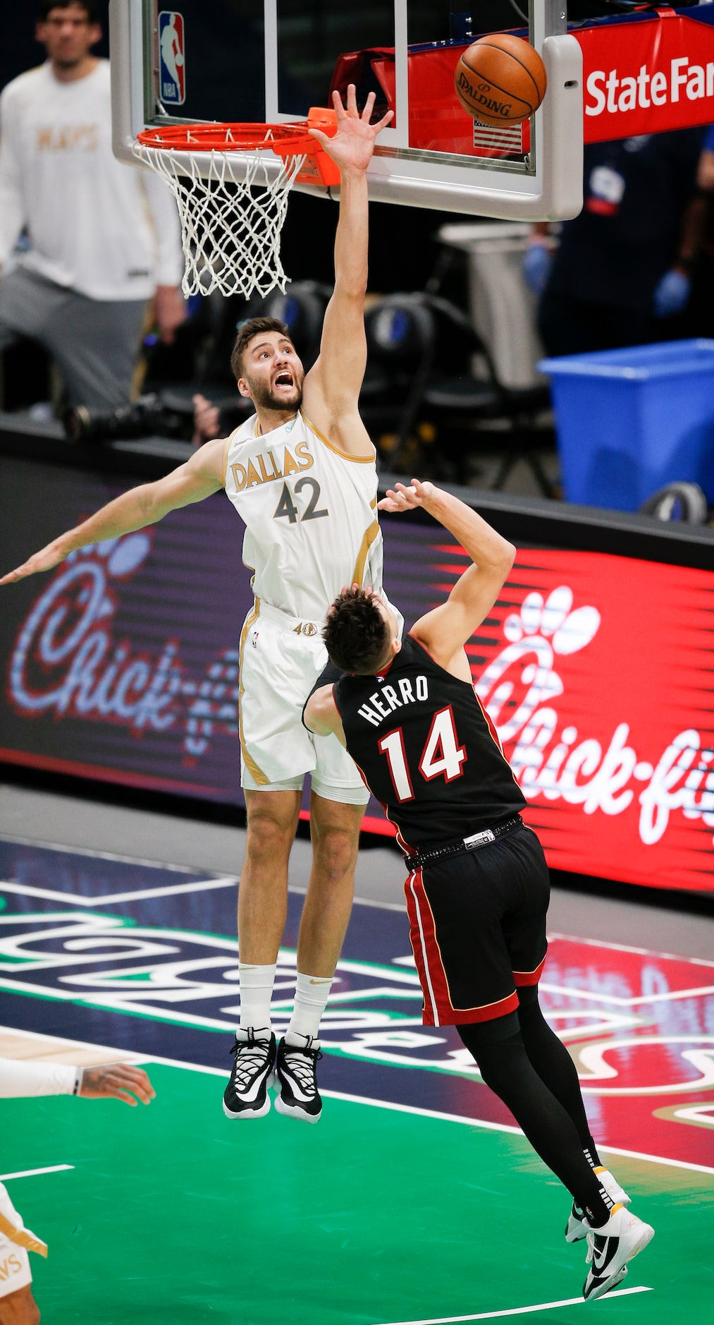 Miami Heat guard Tyler Herro (14) attempts a shot as Dallas Mavericks forward Maxi Kleber...