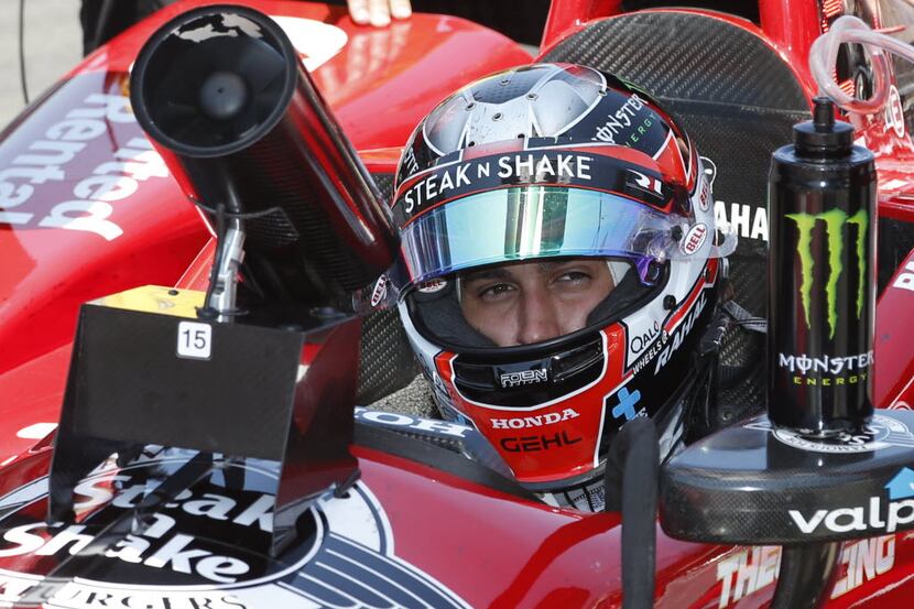 May 23, 2016; Indianapolis, IN, USA; Verizon Indy Car driver Graham Rahal sits in his car in...