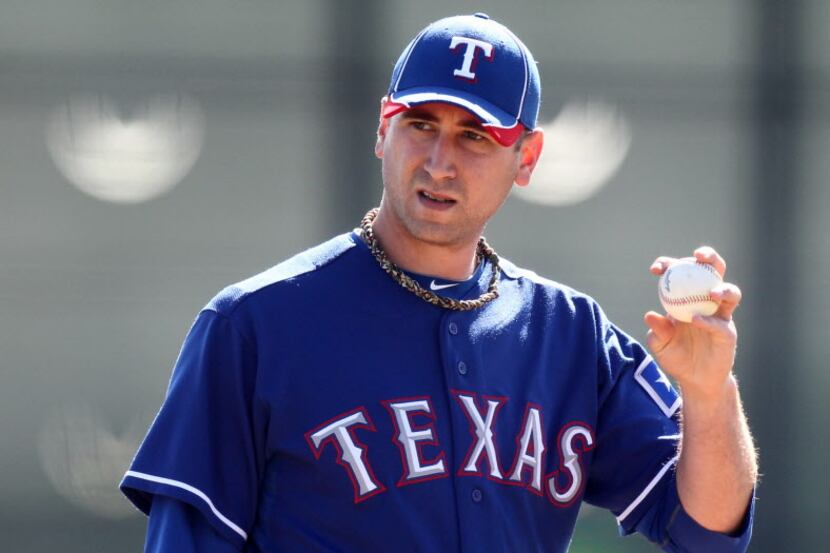 Texas Rangers pitcher Michael Kirkman (44) pitches during Texas Rangers Spring Training at...