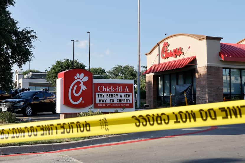 Police tape is seen out front of a Chick-fil-A after a shooting, Wednesday, June 26, 2024,...