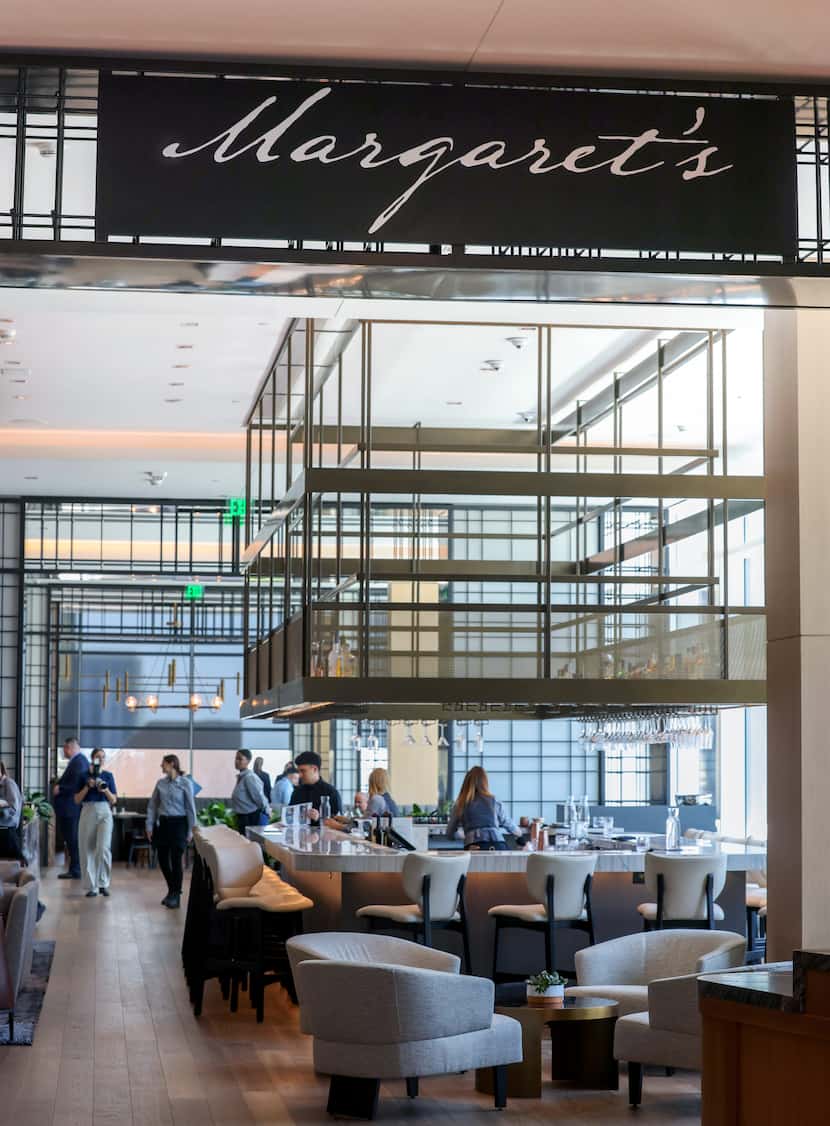 A bar with a view of Dallas’ skyline fills the entry dining room at Margaret’s, a new...