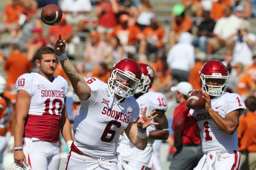 DALLAS, TX - OCTOBER 14:  Baker Mayfield #6 of the Oklahoma Sooners and Kyler Murray #1 of...