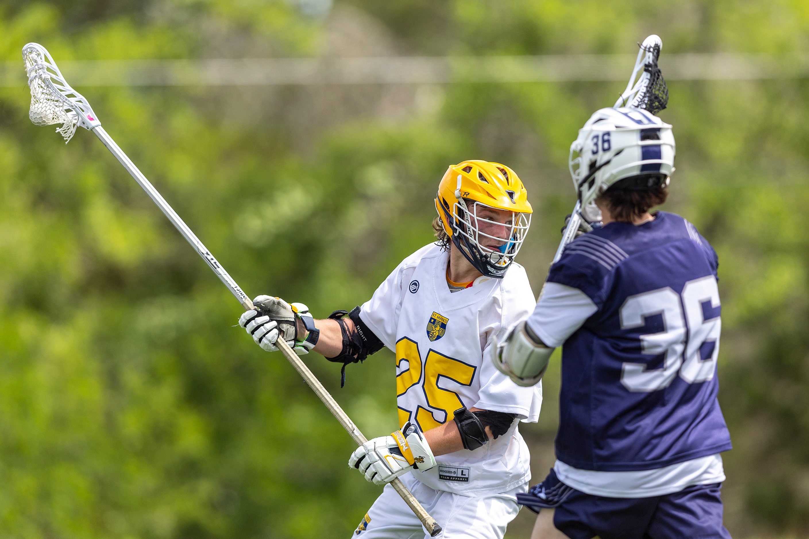 St. Mark's Grant Warnecke (25) looks to pass over Episcopal School of Dallas’ Jack Whitham...