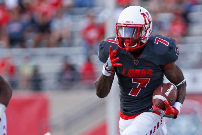 New Mexico running back Teriyon Gipson (7) sprints to the end zone to score a touchdown...