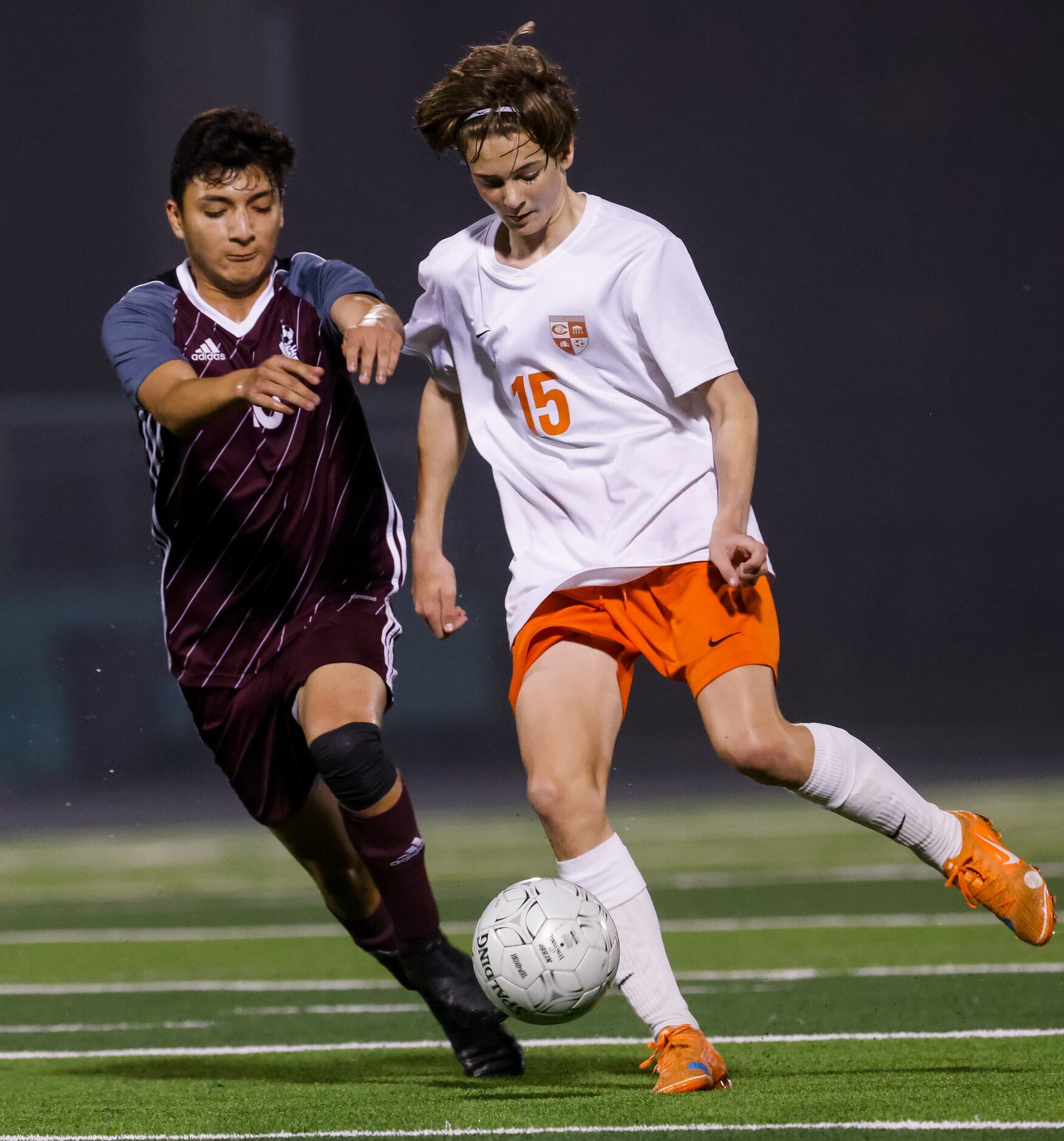 Celina's Hank Melton (15) and Palestine's Arturo Nieto (10) battle for the ball during the...