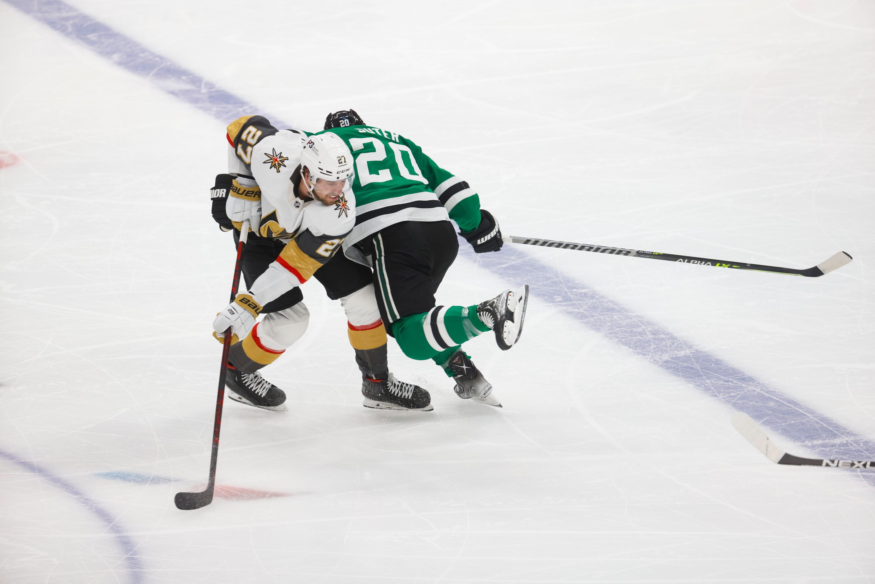 Dallas Stars defenseman Ryan Suter (20) collides with Vegas Golden Knights defenseman Shea...