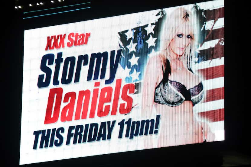 A sign at Little Darlings Las Vegas advertises an upcoming performance at the strip club by...