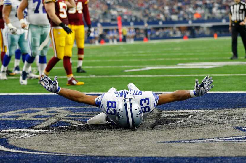 Dallas Cowboys wide receiver Terrance Williams (83) celebrates tight end Jason Witten's...