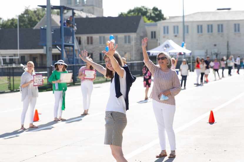 Providence Christian School of Texas teachers did a drive-by end-of-the-year celebration in...