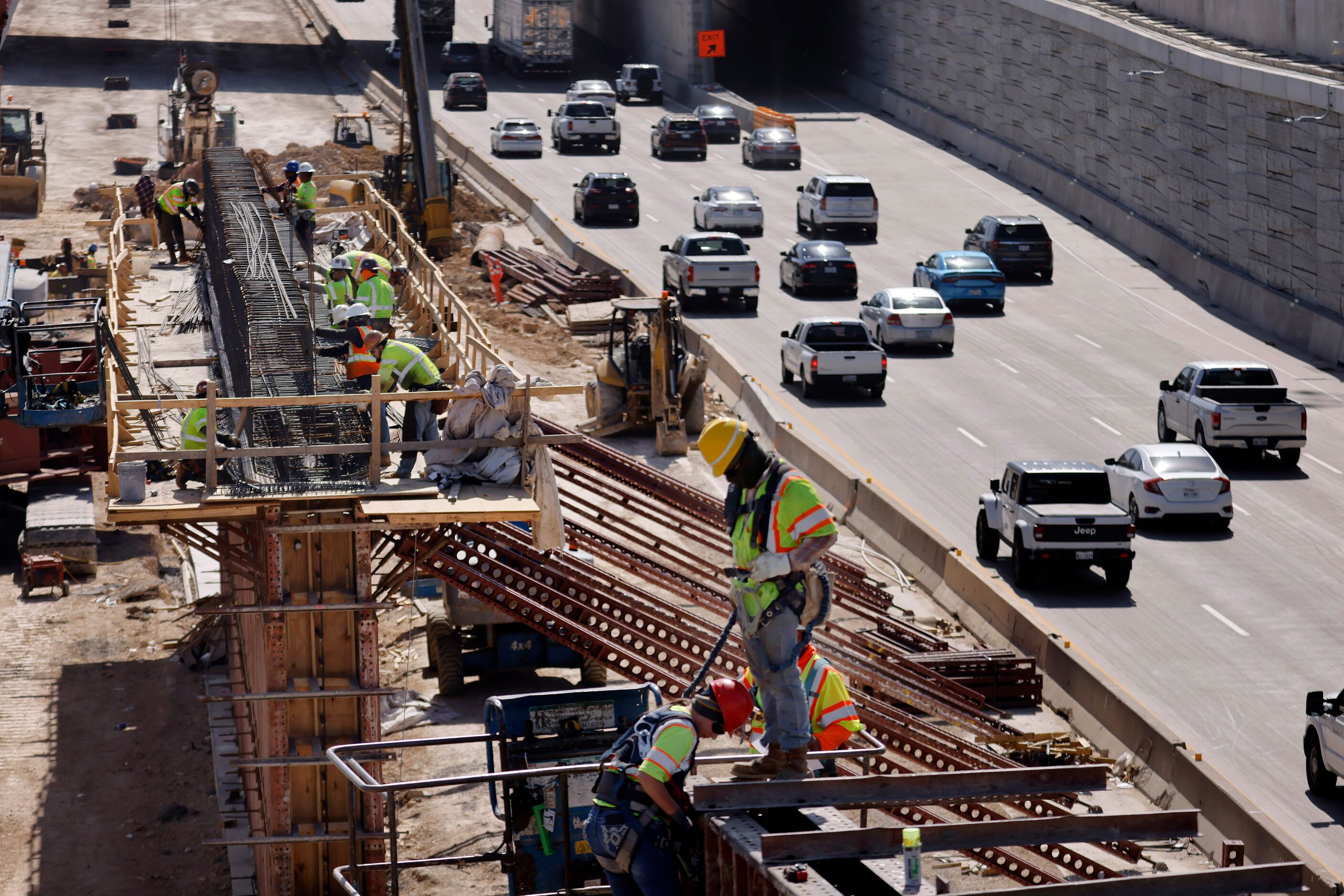 Crews construct support structures for the $172 million Southern Gateway Park on Interstate...