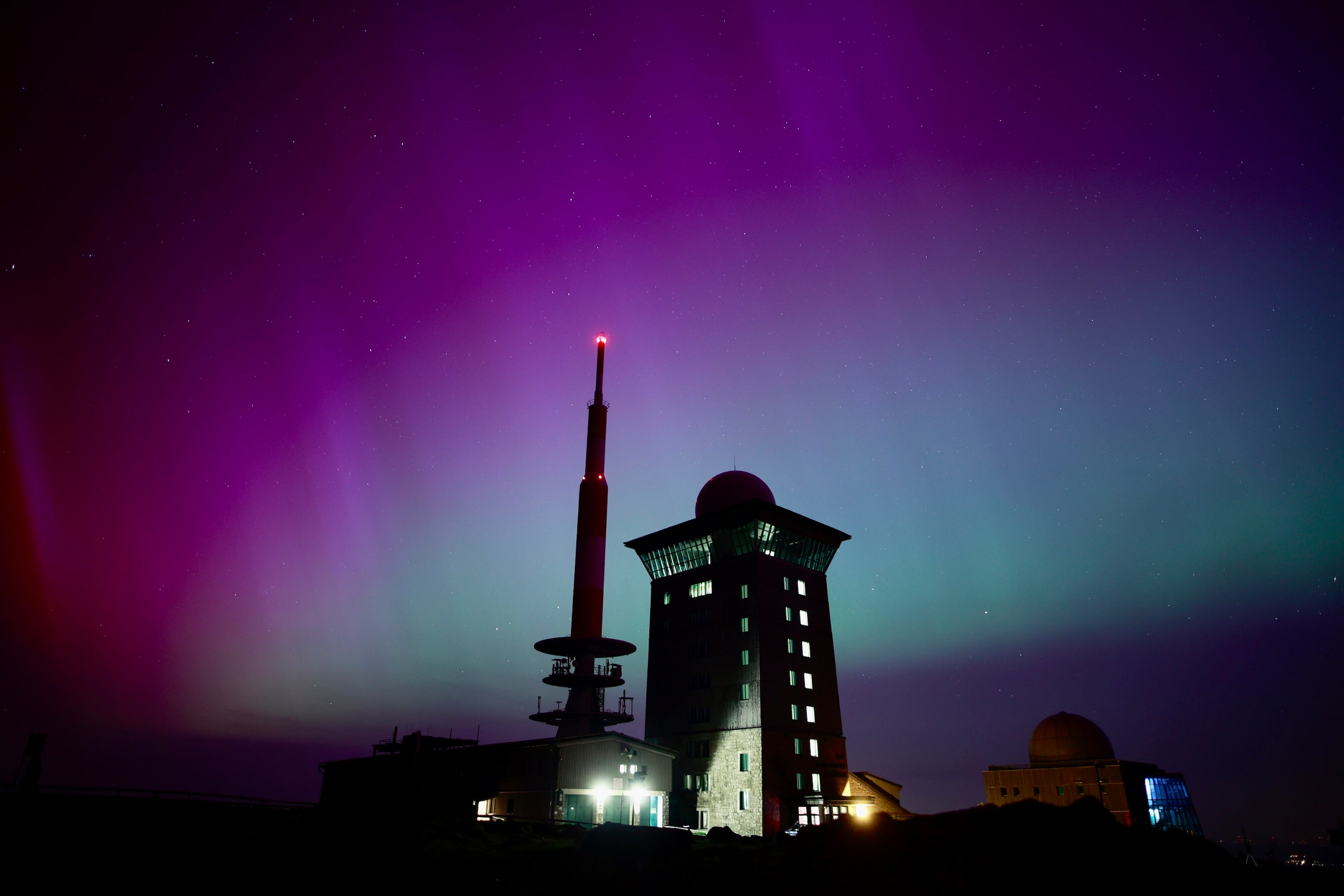 Northern lights appear in the night sky above the Brocken early Saturday, May 11, 2024, in...