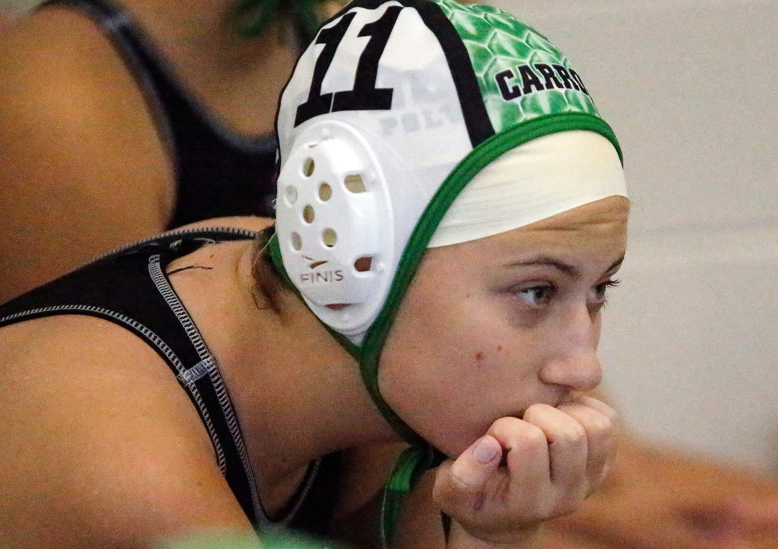 Southlake’s Lauren Anderson (11) looks on from the bench in the early going as Southlake...