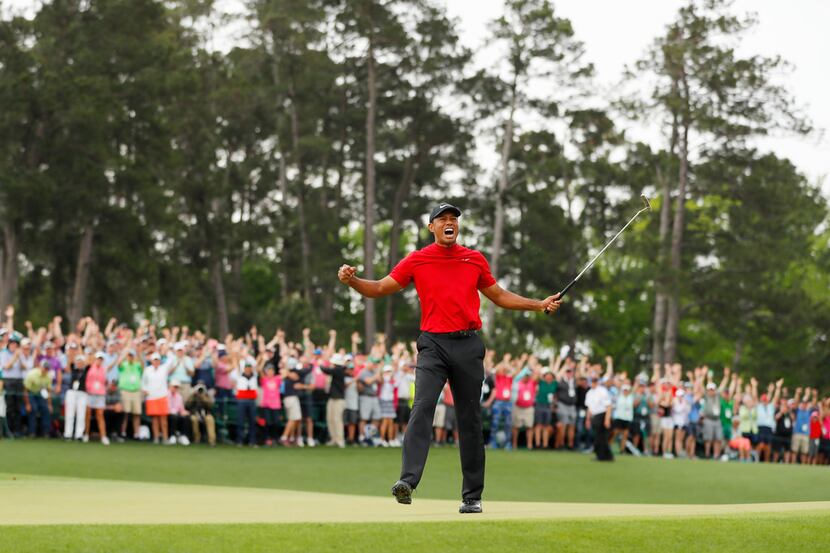 AUGUSTA, GEORGIA - APRIL 14: (Sequence frame 3 of 12) Tiger Woods of the United States...
