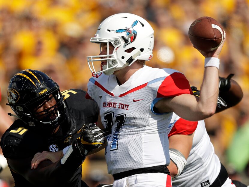 COLUMBIA, MO - SEPTEMBER 24:  Quarterback Daniel Epperson #11 of the Delaware State Hornets...