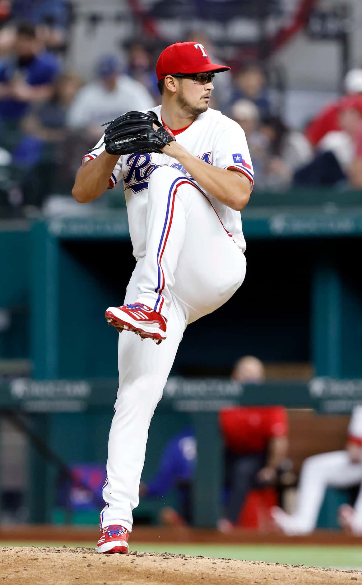 Texas Rangers starting pitcher Dane Dunning (33) throws against the Toronto Blue Jays during...