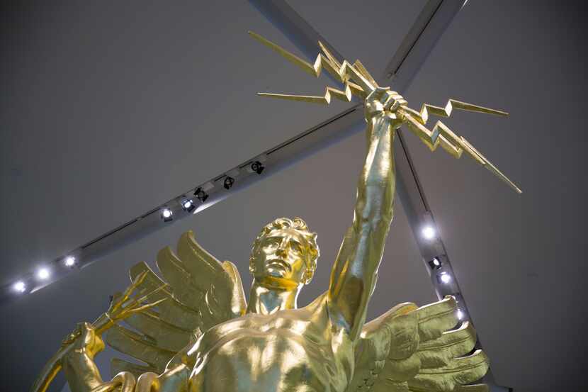 The Spirit of Communication statue is seen in the lobby of AT&T's downtown headquarters...