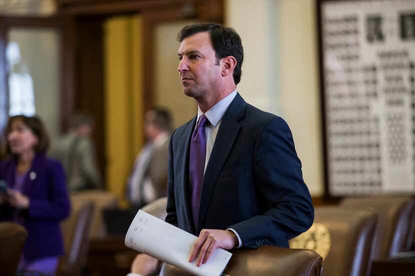 Representative Craig Goldman of Austin stands at his desk on the third day of the 86th Texas...