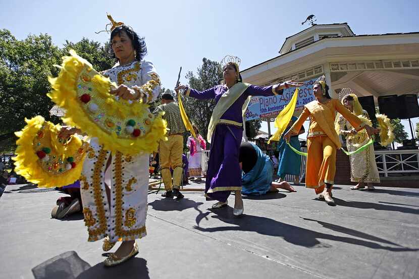 The Maharlika Dancers, U.S.A., perform a traditional Phillipine dance during Plano AsiaFest...