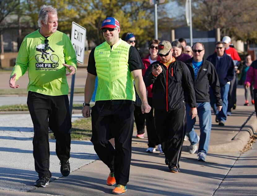 
Grand Prairie Mayor Ron Jensen (left) speaks with 2014 Olympic bobsledder Johnny Quinn...