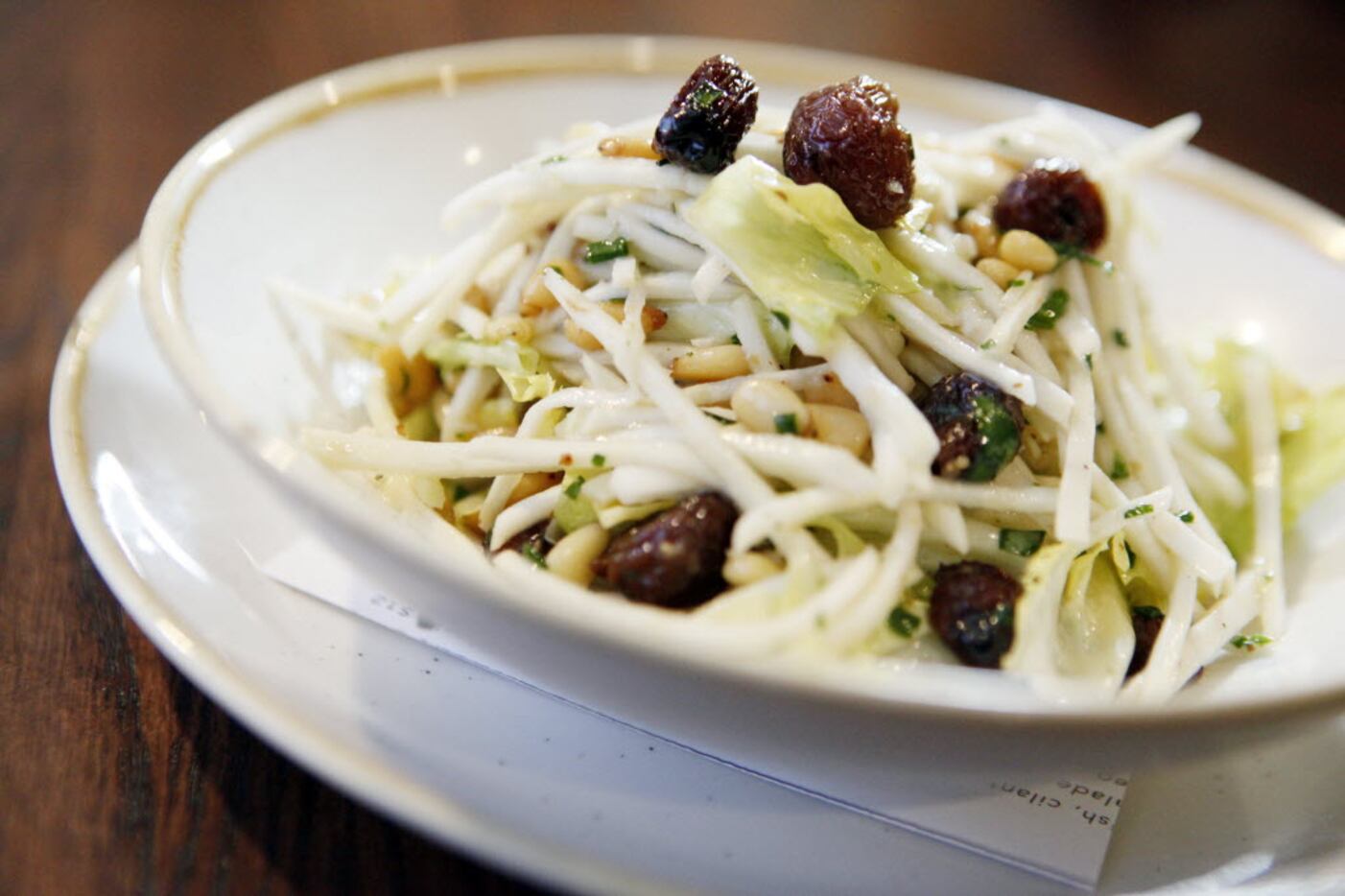 Wayward Son's celery root Waldorf salad with pine nuts, escarole and roasted grapes 