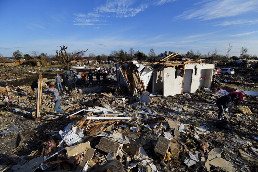 The damage on Kelso Court, south of Interstate 30 and the Bush Turnpike, after an EF-4...