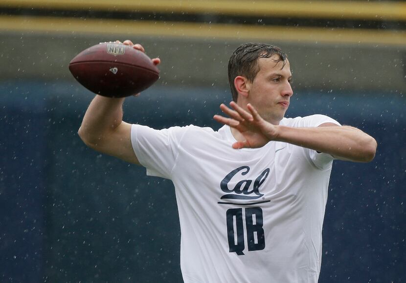 In this March 24, 2017 photo, California quarterback Davis Webb throws during NFL football...