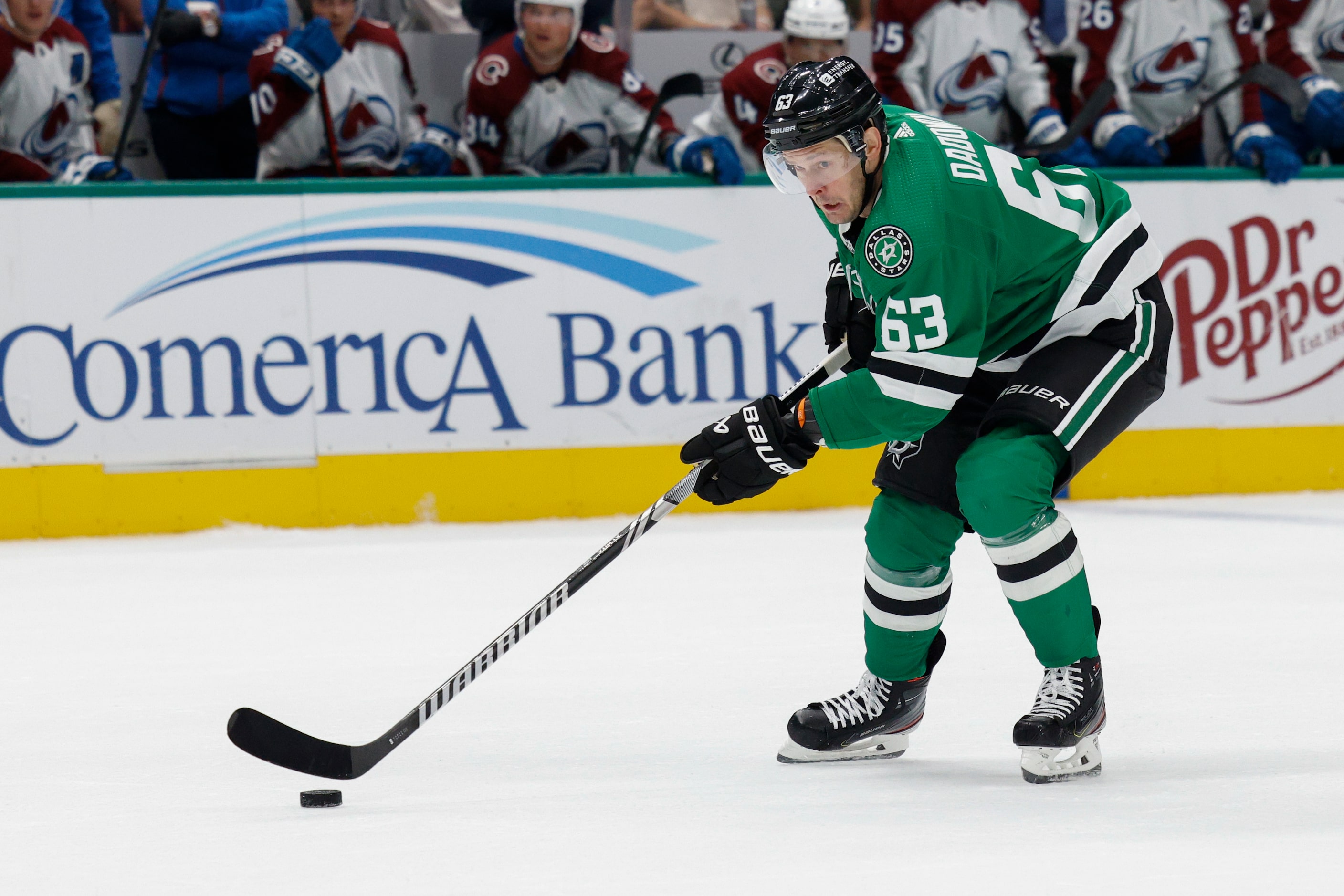 Dallas Stars right wing Evgenii Dadonov (63) skates towards the Colorado Avalanche goal...