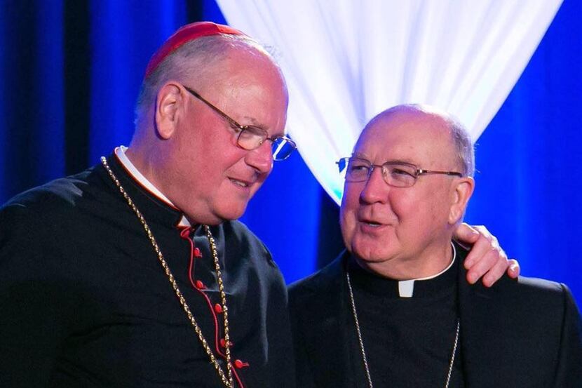 Archbishop of New York Timothy Cardinal Dolan (left) talked with Dallas Diocese Bishop Kevin...