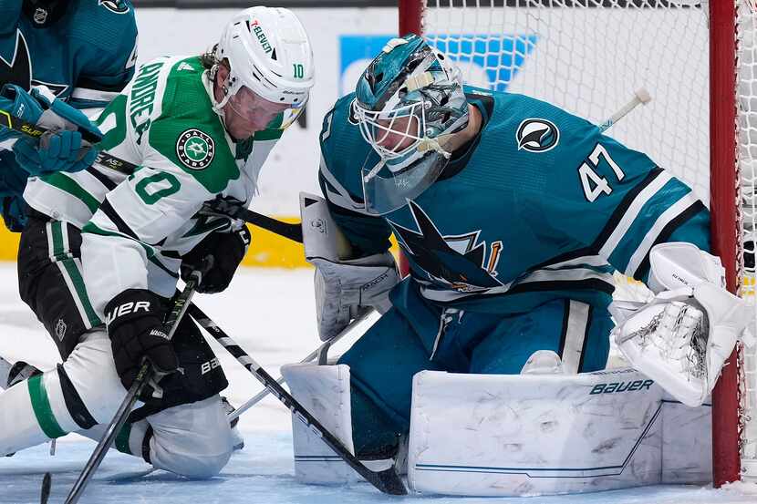 San Jose Sharks goaltender James Reimer (47) blocks a shot by Dallas Stars center Ty...