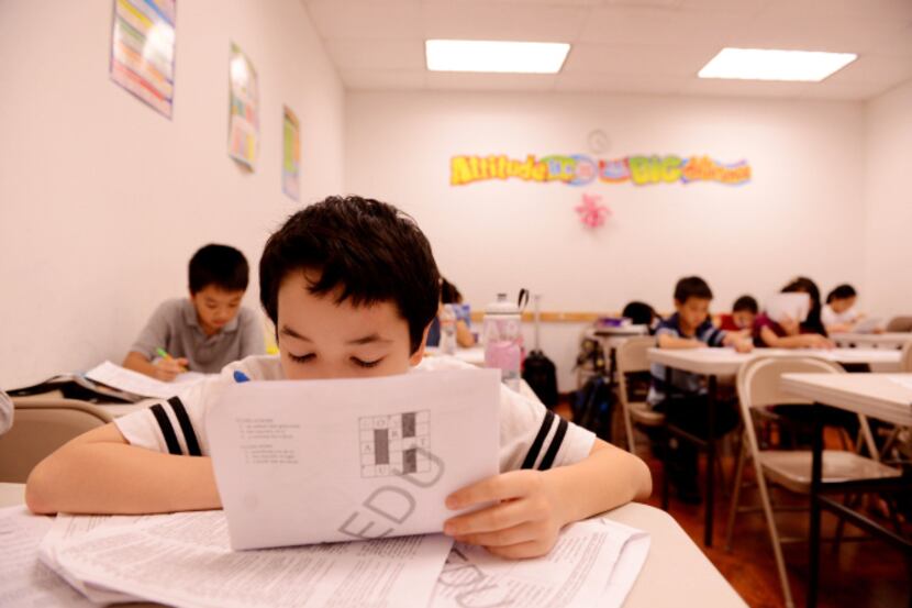 Ian Margolis completes a lesson at HuaYi Education, a Chinese school offering supplemental...