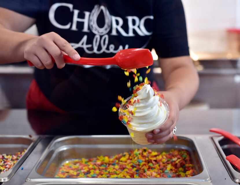 It's raining Fruity Pebbles! Vanessa Zapata prepares an Alley 3 dessert with cereal topping.
