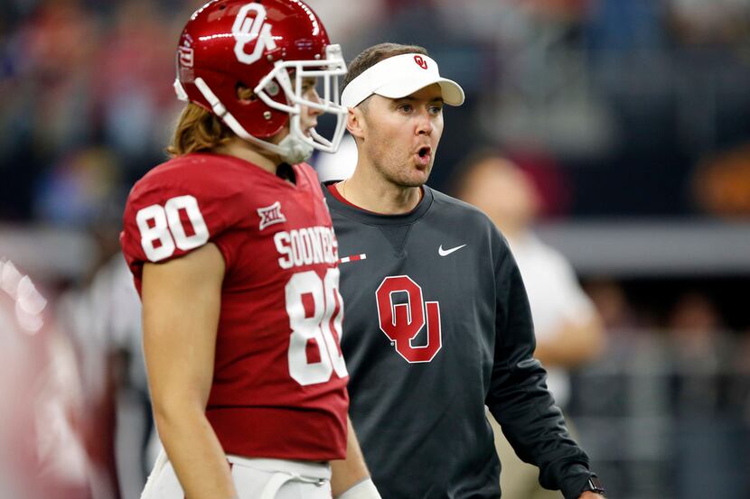 Oklahoma Sooners head coach Lincoln Riley watches warm ups before their Big XII Championship...