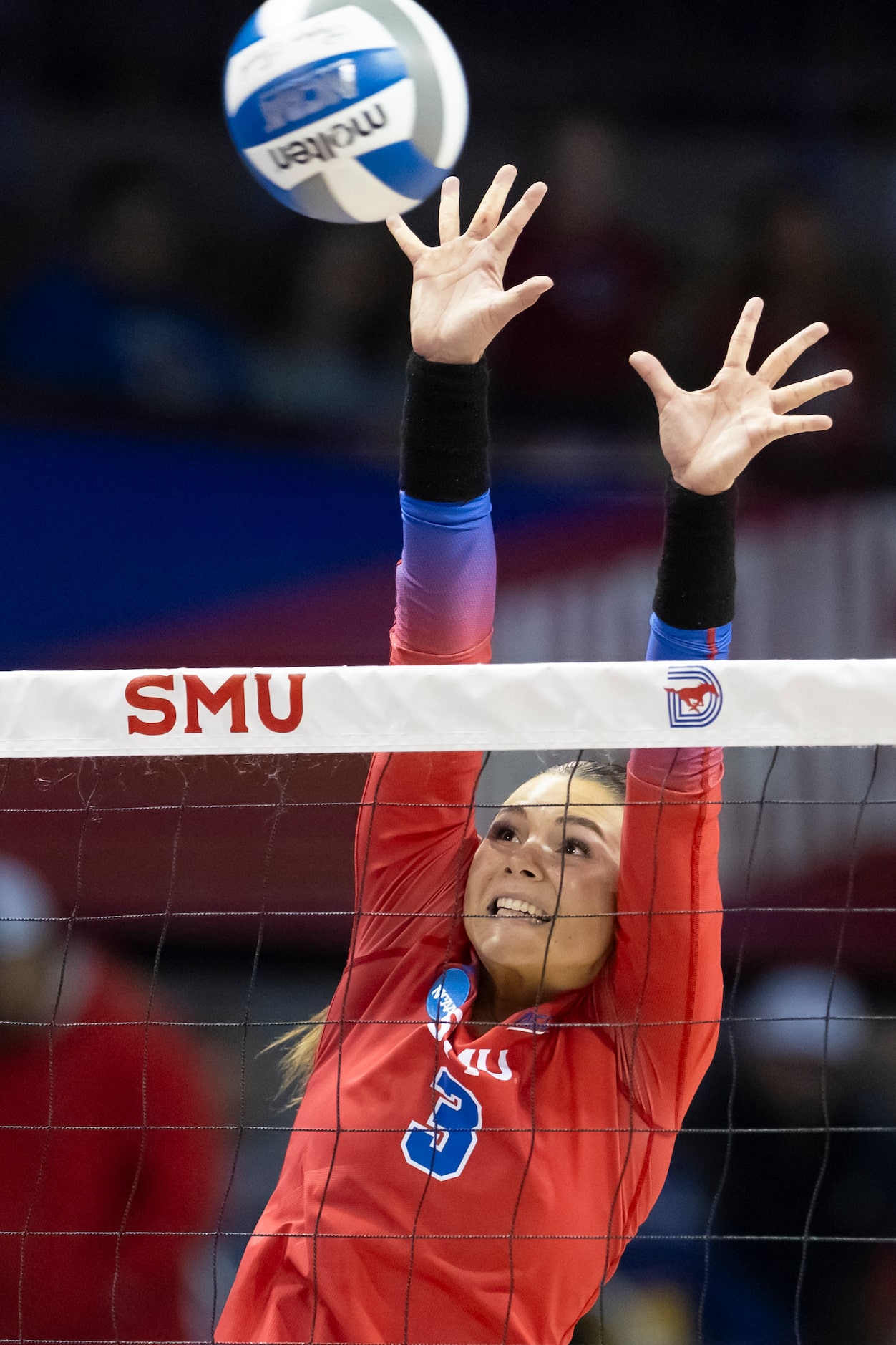 SMU’s Celia Cullen (3) attempts to block a spike from Missouri during an NCAA college...